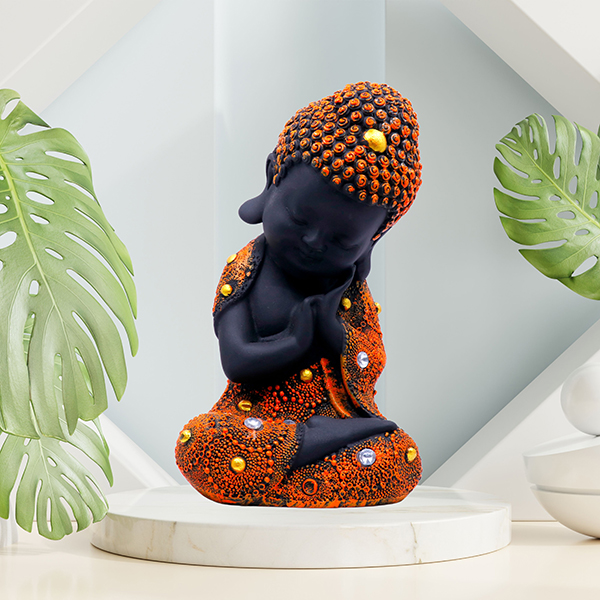Baby Monk Buddha  Showpiece for Home Decor (Black & Orange) Polyresin – 8 Inch