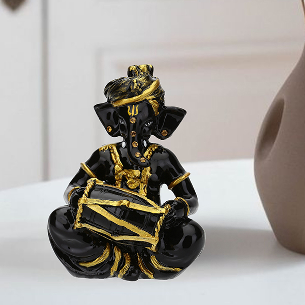 Musician Dholak Ganesha Idol Showpiece (Black & Golden) Polyresin – 4 Inch