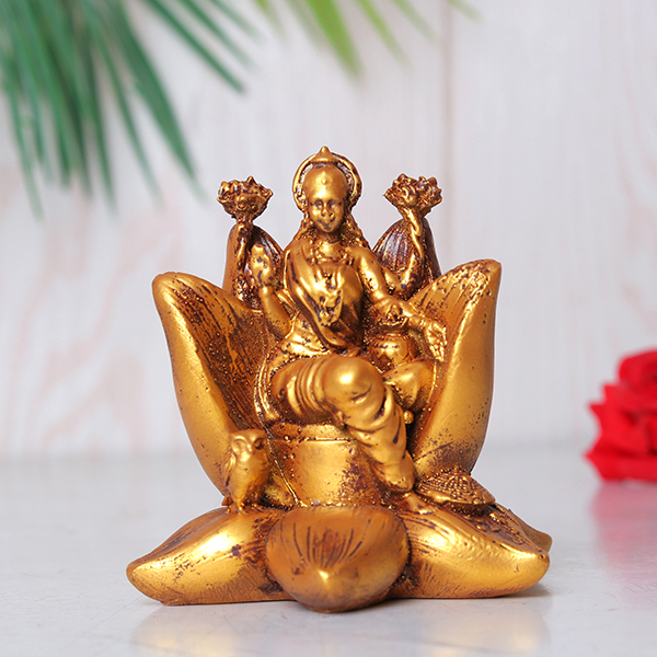 Goddess Laxmi Idol Showpiece for Home Decor (Golden) Polyresin – 4 Inch