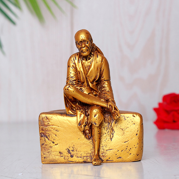 Shirdi Sai Baba Showpiece Idol Statue Especially for Car Dashboard (Golden) Polyresin – 4 Inch
