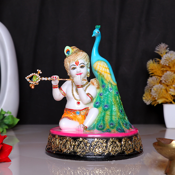 Bal Krishna Statue Sits Beside a Peacock Idol Showpiece for Home Decor (Golden Foil) Marble – 7 Inch