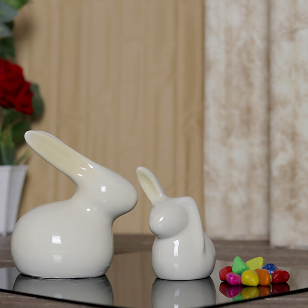 Rabbit Showpiece Set of 2 for Home Decor (Light Yellow) Polyresin – 5.5 Inch